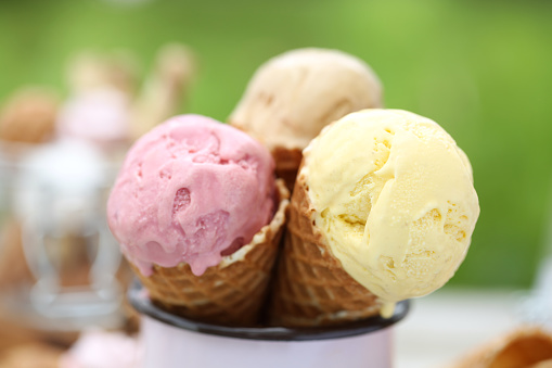 raspberry ice cream with berries, selective focus