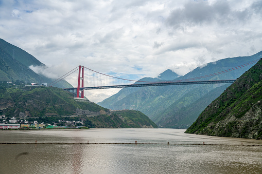 The elevated bridge over a cloudy river