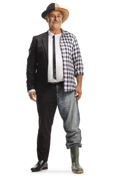 istock Mature man, half dressed as a businessman, half as a farmer 1888447449