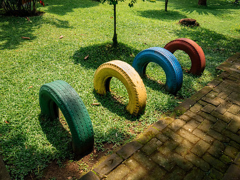 Used tires can be reused for various purposes, one of which is as garden decoration