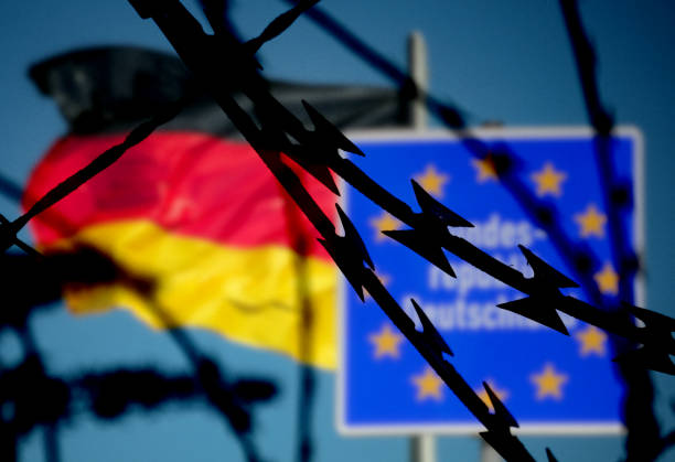 istock Germany and the border behind the barbed wire 1888768171