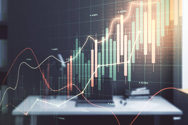 istock Double exposure of abstract creative financial diagram and modern desk with computer on background, banking and accounting concept 1888769990