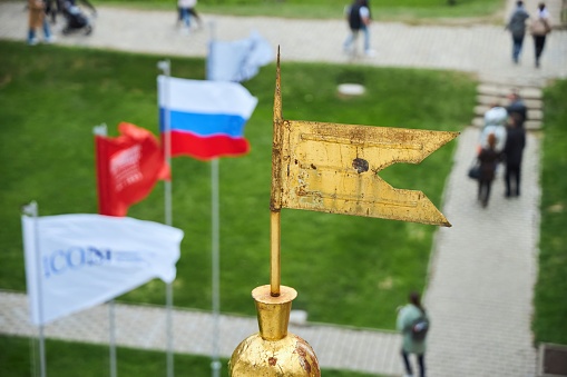 Rostov Veliky, Russia - May 05, 2022: Rostov Kremlin. A medieval building of the 17th century. An ancient flag