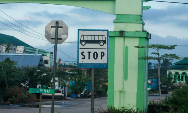 istock Bus Stop Sign on post pole, traffic road roadsign 1888879577