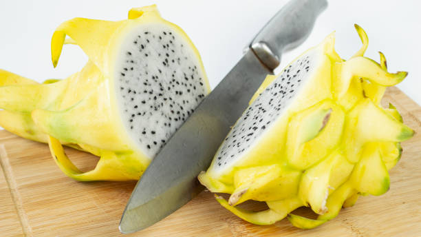 istock A bright yellow dragon fruit cut in half. 1888953869