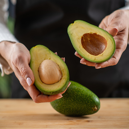 Fresh, organic avocado, a superfood rich in monosaturated fat, vitamins, minerals, fibers, and phytonutrients