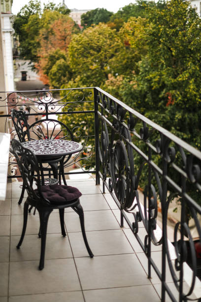 istock wrought iron table with chairs on the hotel balcony 1888996976