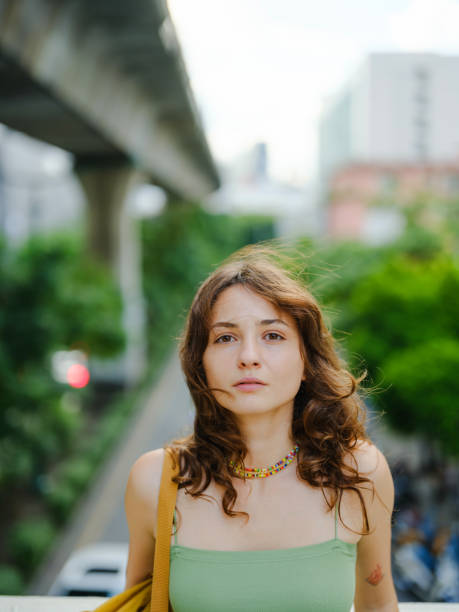 Elegant woman walking in Bangkok downtown