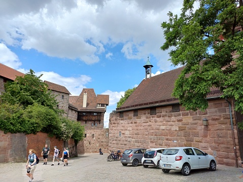 Nuremberg, Germany - Jun 10, 2023: People enjoy sightseeing at Nuremberg castle, Germany.