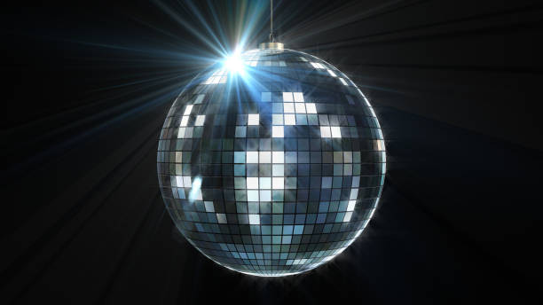 istock Rotating and glowing disco ball on black background 1889061158