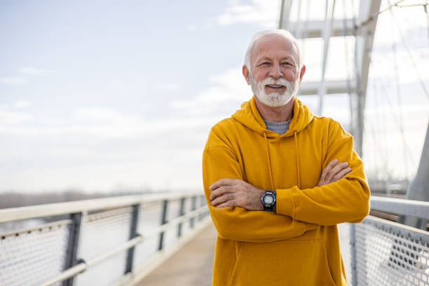 istock Portrait of smiling elderly man looking at camera 1889066304