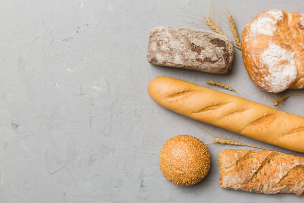 istock Homemade natural breads. Different kinds of fresh bread as background, top view with copy space 1889067350