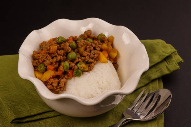 Filipino Picadillo or Giniling is a Flavorful and Hearty Combination of Ground Meat, Vegetables and Tomatoes, Served with Rice.