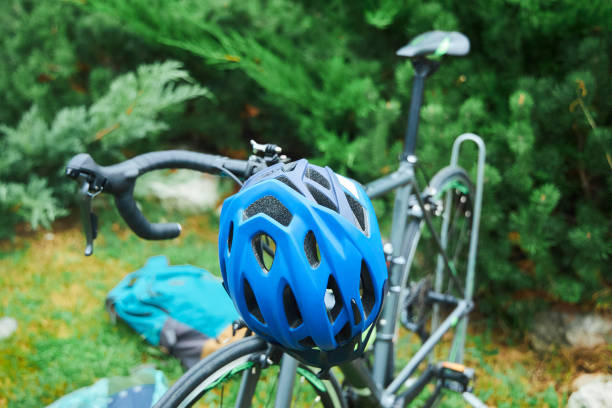 istock A bicycle helmet is hanging on the handlebars. Sports uniforms for loyal athletes. 1889093716