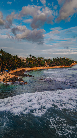Dalawella beach, Unawatuna, Sri Lanka - December 26, 2023:
Drone point of view on Dalawella beach in Sri Lanka.