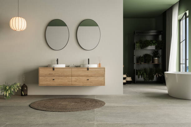 istock Modern minimalist bathroom interior, bathroom cabinet, double sink, wooden vanity, interior plants, bathroom accessories, bathtub, sea view, white and green wall, concrete floor 1889130874