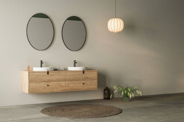 istock Modern minimalist bathroom interior, bathroom cabinet, double sink, wooden vanity, interior plants, bathroom accessories, bathtub, sea view, white and green wall, concrete floor 1889132469