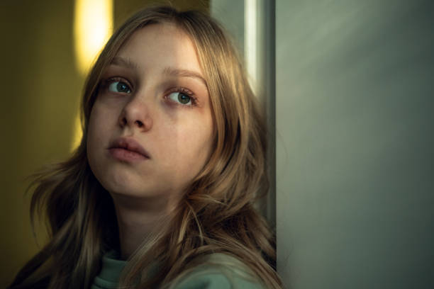 Sad girl Sad girl at home. Depression or anxiety concept. critical thinking kids stock pictures, royalty-free photos & images