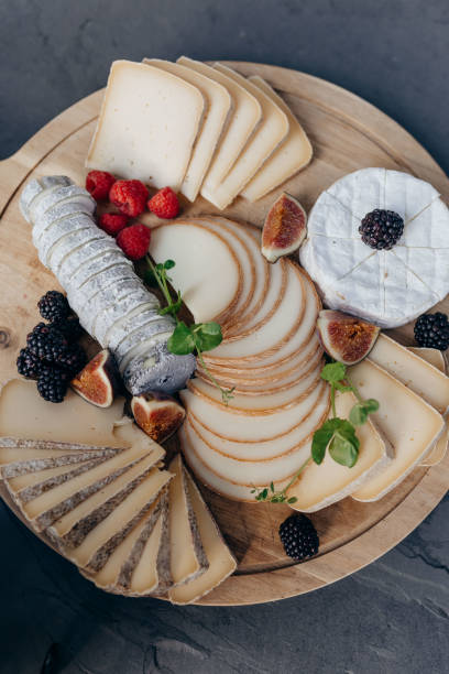 istock Correct serving of cheese plate, cheeses lie clockwise. Exquisite lunch, festive dinner on buffet. 1889158693