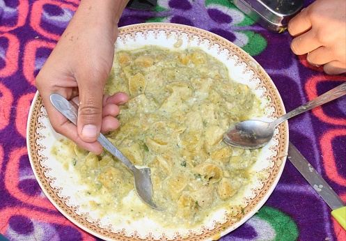 Chamoli, Uttarakhand, India. A captivating photo showcasing a spicy dish from Uttarakhand, skillfully prepared using the locally famed Malta fruit.