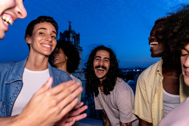 istock Friends having fun during party on the rooftop 1889224006