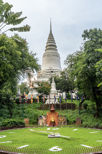A temple and park in the middle of the city center of Phnom Penh
