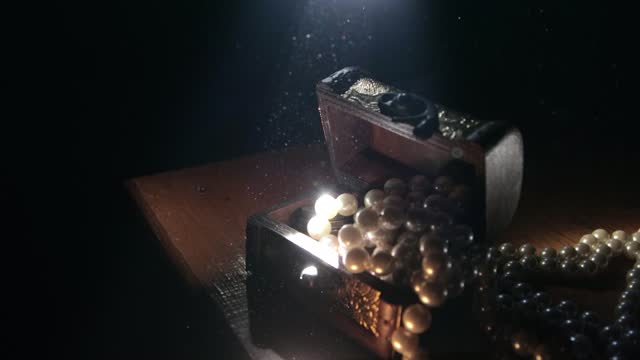 A wooden chest with pearls