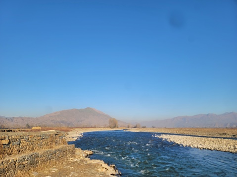Sunny day images at the bank of river Swat Pakistan