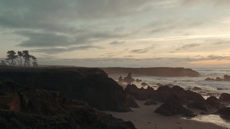 Scenic view of the rock formations on the Glass Beach near Fort Bragg at sunset in California, USA