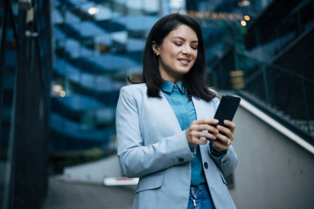 istock Young businesswoman using cell phone 1889324228