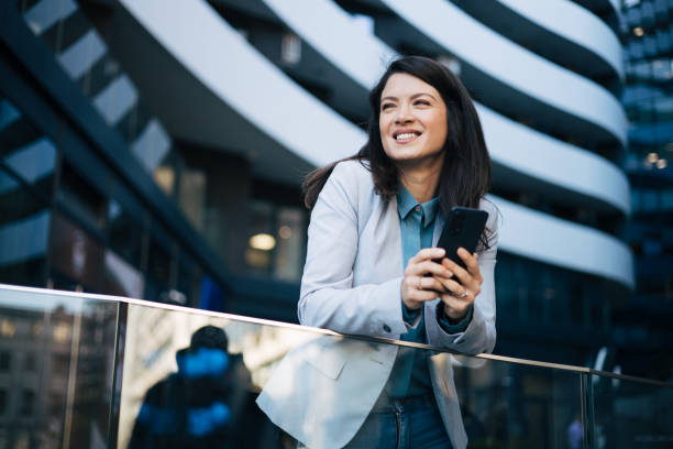 istock Young businesswoman using cell phone 1889329692