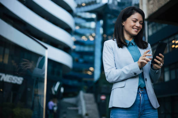 istock Young businesswoman using cell phone 1889339207