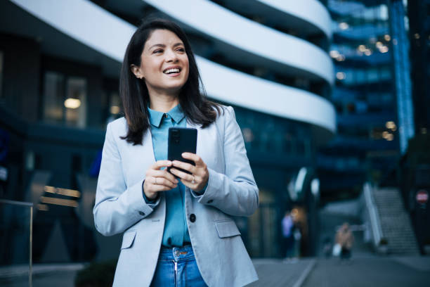istock Young businesswoman using cell phone 1889341266