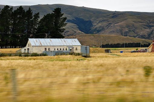 An outdoor shed in the Southland region of New Zealand, situated alongside Highway 6.