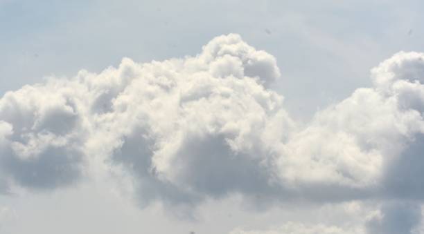 istock background photo of white clouds and blue sky 1889350604