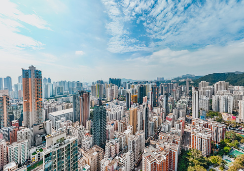 Aerial view of Hong Kong apartments in cityscape background