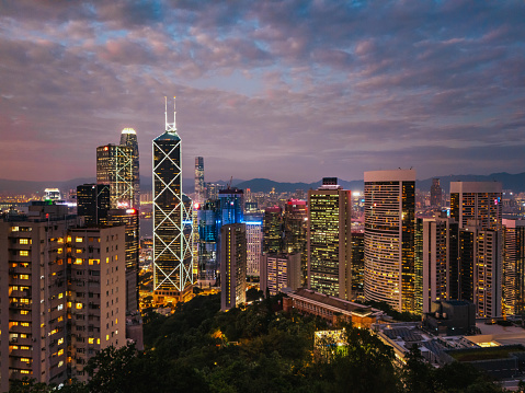 Aerial View of Hong Kong City and Victoria Harbour at twilight