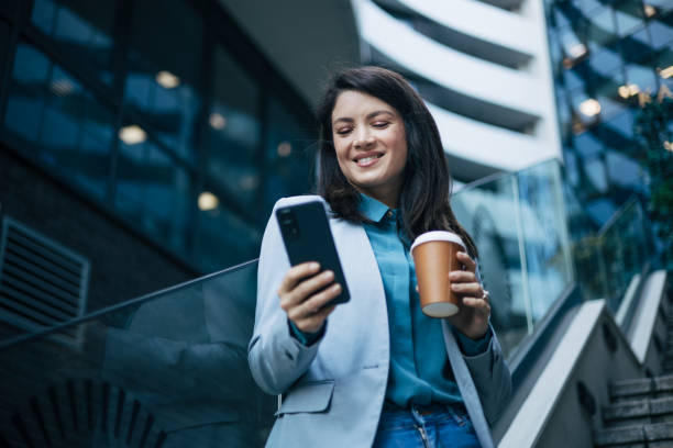 istock Young businesswoman using cell phone 1889367896