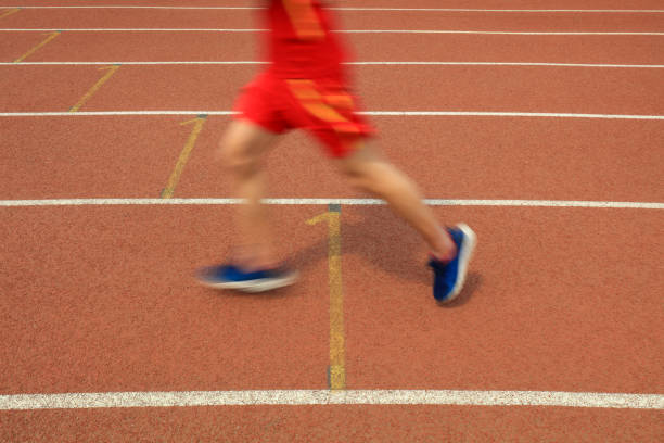 istock Long distance runners are running on the track 1889388308