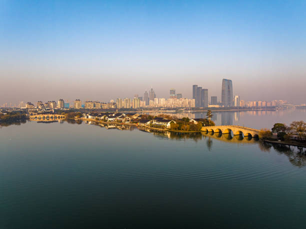 istock he calm lake surface and urban architecture 1889497448