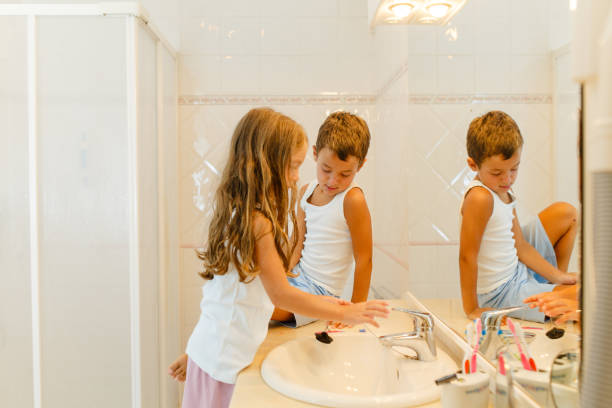 istock Children brushing teeth as a daily hygiene routine 1889508814