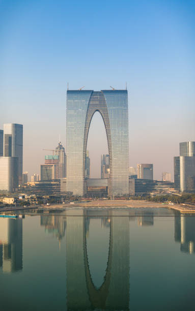 istock The calm lake surface and urban architecture 1889513011