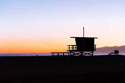 Lifeguard's towers at Venice Beach during sunset