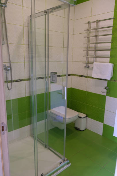 istock Shared shower room and toilet in the hotel. Modern design. 1889536371