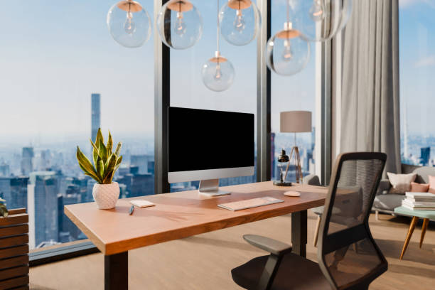 istock large modern contemporary office with pc workspaces and indoor plants vertical garden; panoramic view rural landscape; sustainability work environment; 3D rendering 1889541202