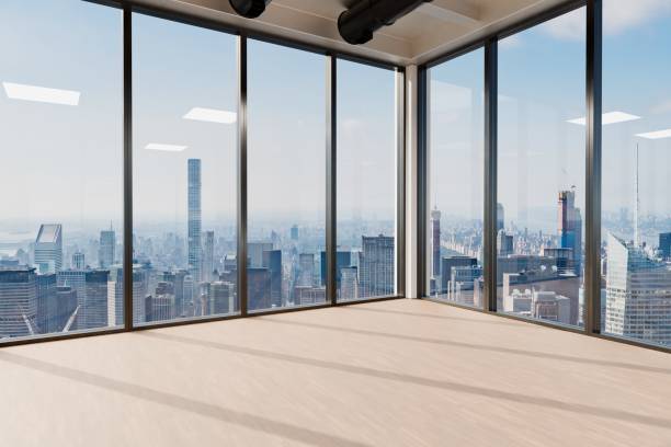 istock large modern contemporary office with pc workspaces and indoor plants vertical garden; panoramic view rural landscape; sustainability work environment; 3D rendering 1889541723