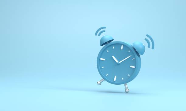 istock 3D render, 3D illustration. Vintage circle clock icon. Simple twin bell alarm clock on blue background. Minimal creative concept. 1889563121