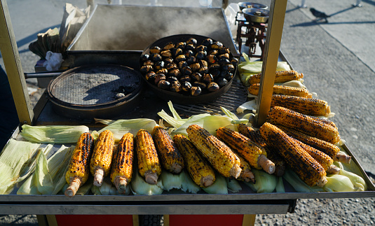 Selling Chestnuts and corn