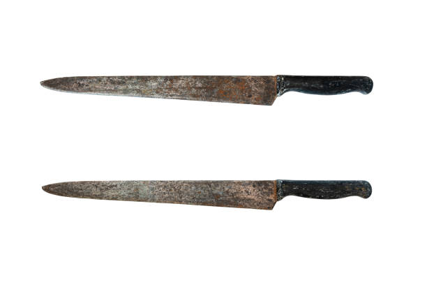istock Old rusty chef's knife on an isolated white background. 1889566874