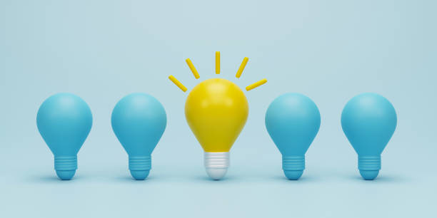 istock 3d render 3d illustration. Yellow light bulb between the bulbs others on blue light background. Concepts of leadership, innovation, different creative idea and individuality. 1889568656